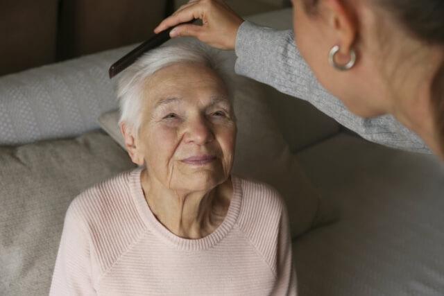 Elderly Woman Hair Combing